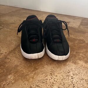 Jordan Boy’s Black and White Sneakers with Red Accents